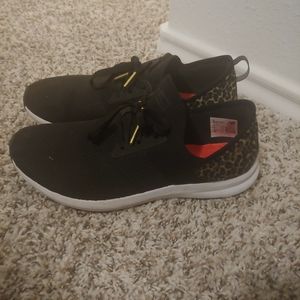 New Balance leopard tennis shoes